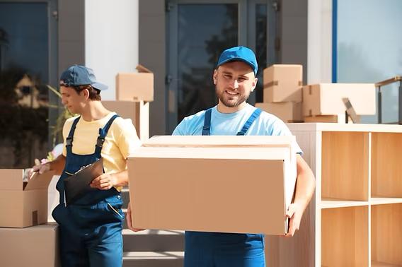 Office movers carrying boxes and a clipboard inventory